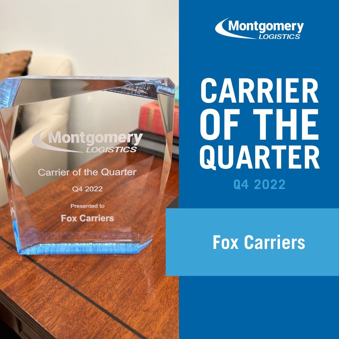 Image of a glass award on a desk for Fox Carriers, Montgomery Logistic's Q4 2022 Carrier of the Quarter.